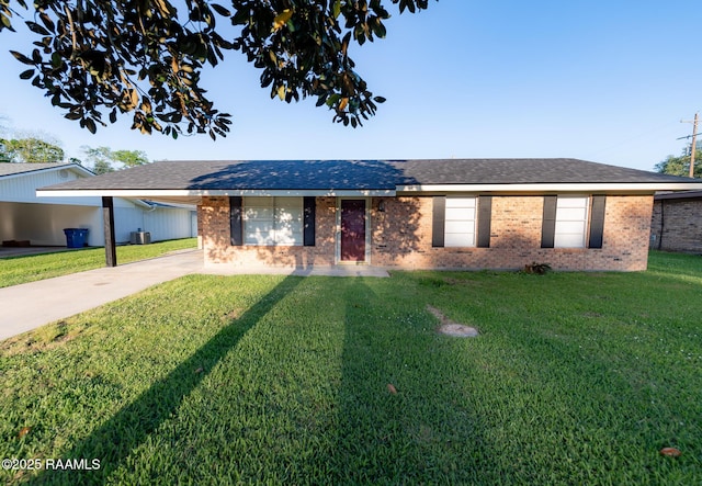 single story home with concrete driveway, brick siding, central air condition unit, and a front lawn