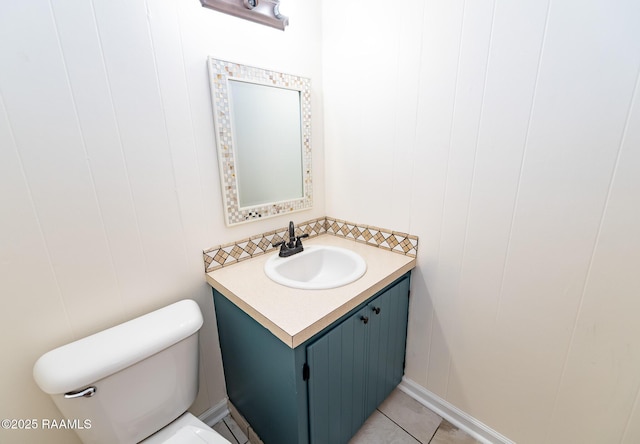 bathroom with toilet and vanity