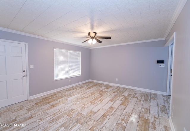 empty room with baseboards, light wood-type flooring, crown molding, and ceiling fan