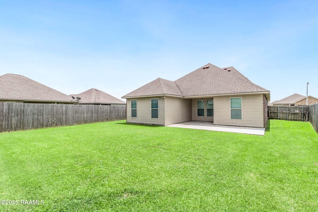 204 Stanwell Ave, Duson, LA 70529 - back of property featuring a patio area and roof with shingles