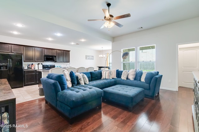204 Stanwell Ave, Duson, LA 70529 - living room featuring a ceiling fan, recessed lighting, wood finished floors, and a chandelier