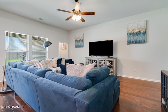 204 Stanwell Ave, Duson, LA 70529 - living area featuring ceiling fan, baseboards, and dark wood finished floors