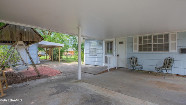 1119 Mary Lee St, Franklin, LA 70538 - view of patio / terrace featuring a carport