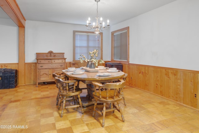 1119 Mary Lee St, Franklin, LA 70538 - dining room with a chandelier, a wainscoted wall, and wooden walls