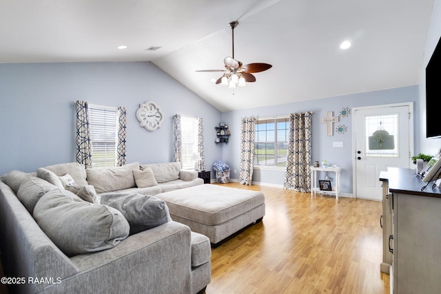 197 John Paul Dr, Opelousas, LA 70570 - living area with a ceiling fan, visible vents, lofted ceiling, light wood finished floors, and baseboards