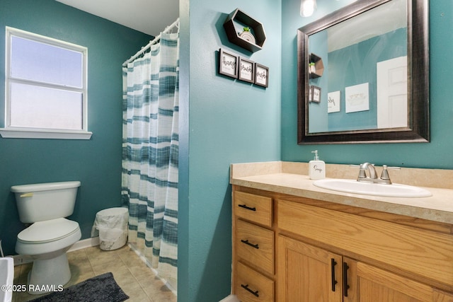 197 John Paul Dr, Opelousas, LA 70570 - full bathroom featuring toilet, tile patterned floors, vanity, and a shower with curtain