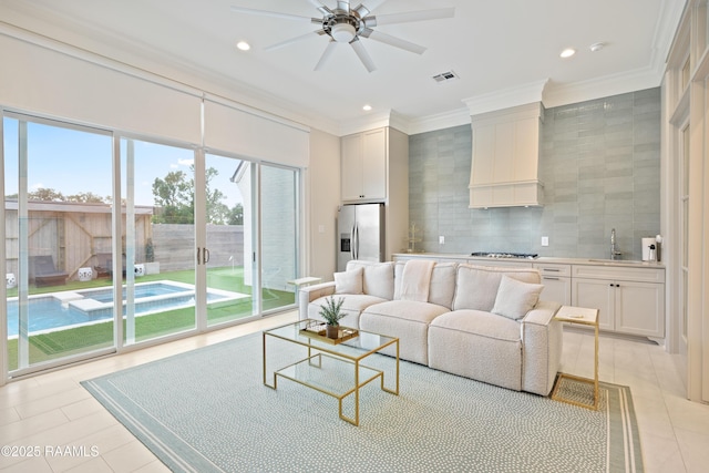211 Crossbill Dr, Lafayette, LA 70508 - living area featuring light tile patterned flooring, visible vents, recessed lighting, ceiling fan, and crown molding