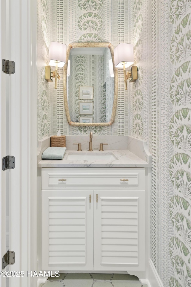 211 Crossbill Dr, Lafayette, LA 70508 - bathroom featuring wallpapered walls, vanity, and tile patterned floors