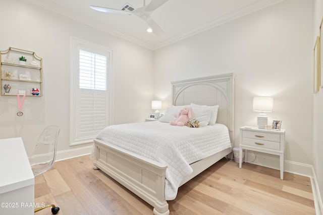 211 Crossbill Dr, Lafayette, LA 70508 - bedroom featuring ceiling fan, light wood-style flooring, baseboards, ornamental molding, and visible vents
