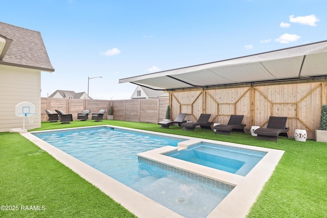 211 Crossbill Dr, Lafayette, LA 70508 - view of pool with a fenced backyard, a yard, and a pool with connected hot tub