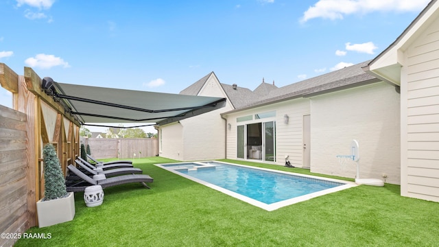 211 Crossbill Dr, Lafayette, LA 70508 - view of pool featuring a fenced backyard, a yard, and a pool with connected hot tub