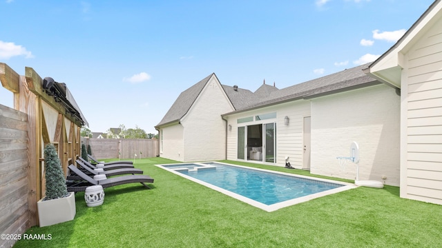 211 Crossbill Dr, Lafayette, LA 70508 - view of pool featuring a fenced backyard, a yard, and a pool with connected hot tub