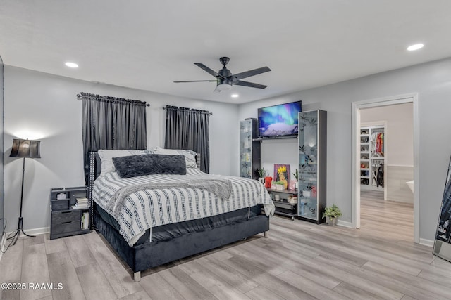 bedroom featuring light wood finished floors, baseboards, a ceiling fan, and recessed lighting