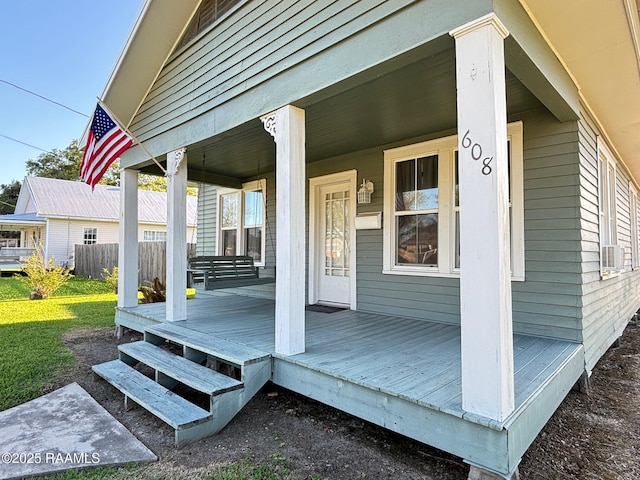 doorway to property featuring a porch