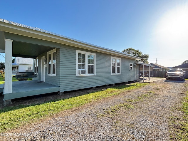 view of home's exterior featuring a porch