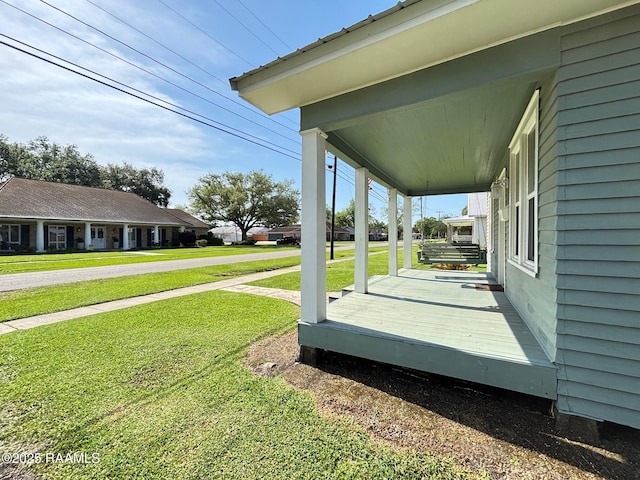 view of yard featuring a porch