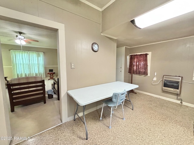 carpeted office with ceiling fan, heating unit, ornamental molding, and baseboards