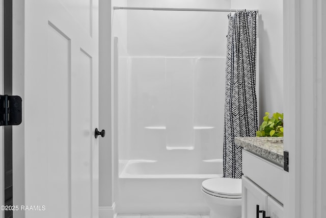 full bath with shower / bath combo, toilet, and vanity