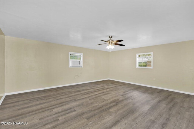 7848 Lake St, Lake Charles, LA 70605 - spare room with wood finished floors, ceiling fan, and baseboards