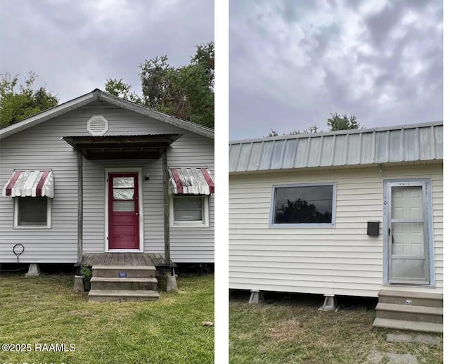 1009/1011 Providence St, New Iberia, LA 70560 - view of front of house with metal roof and a front yard