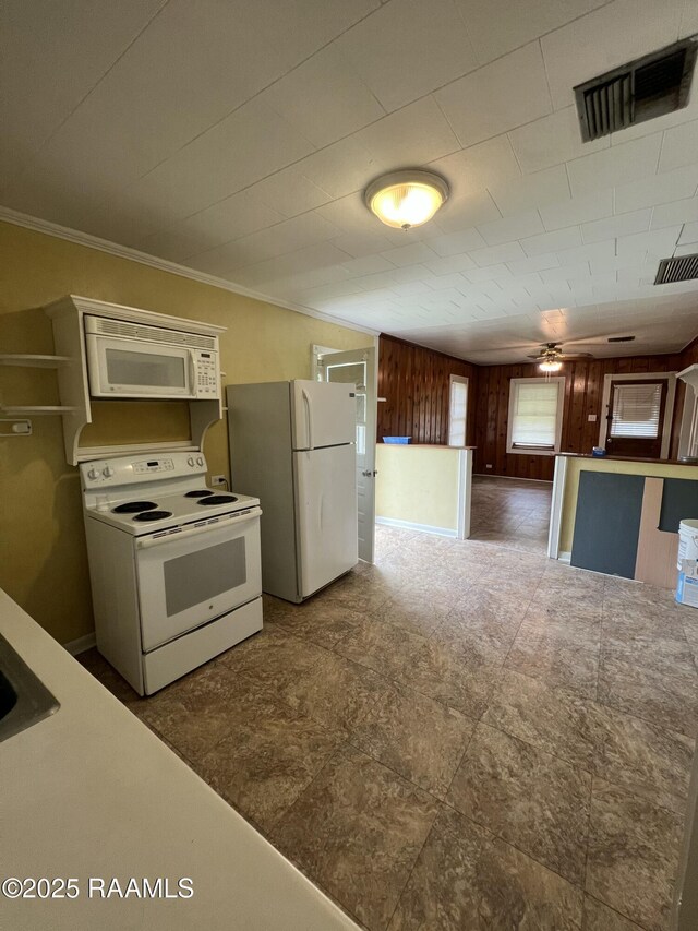 1009/1011 Providence St, New Iberia, LA 70560 - kitchen with ornamental molding, ceiling fan, white appliances, and visible vents