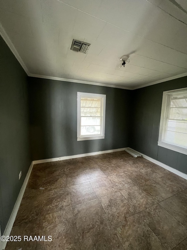 1009/1011 Providence St, New Iberia, LA 70560 - unfurnished room featuring visible vents, baseboards, and ornamental molding