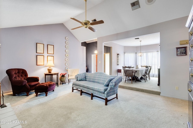 living room featuring visible vents, high vaulted ceiling, a ceiling fan, and light carpet