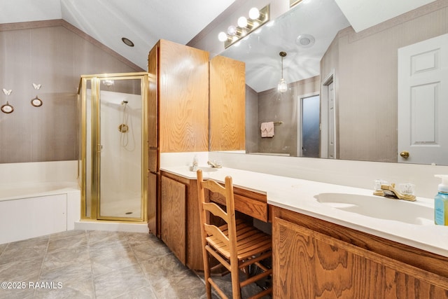 full bathroom featuring a bath, a stall shower, double vanity, and a sink