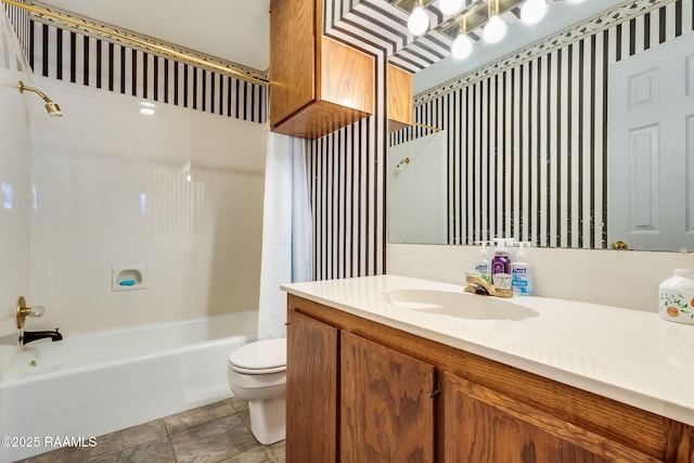 bathroom featuring shower / bath combo, toilet, and vanity