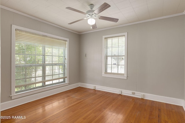311 S Morgan Ave, Broussard, LA 70518 - empty room featuring a healthy amount of sunlight, ornamental molding, and light wood-type flooring