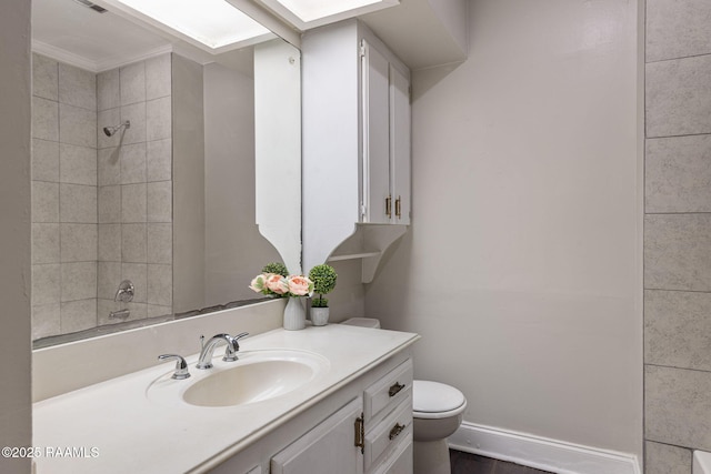 311 S Morgan Ave, Broussard, LA 70518 - bathroom with toilet, baseboards, and vanity