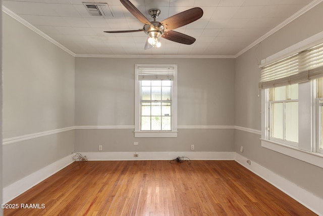 311 S Morgan Ave, Broussard, LA 70518 - unfurnished room with crown molding, wood-type flooring, a ceiling fan, and visible vents