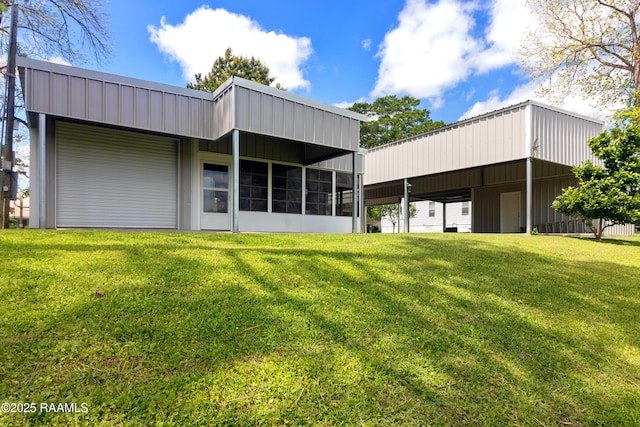 back of property with a yard