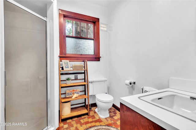 1703 W University Ave, Lafayette, LA 70506 - full bath with toilet, baseboards, a shower stall, and vanity
