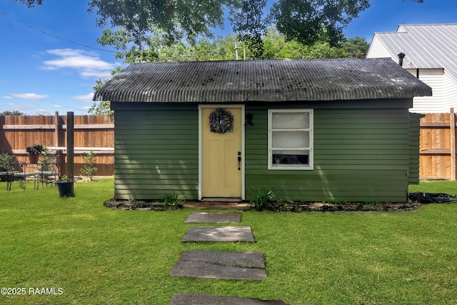 1703 W University Ave, Lafayette, LA 70506 - view of outbuilding with fence and an outbuilding