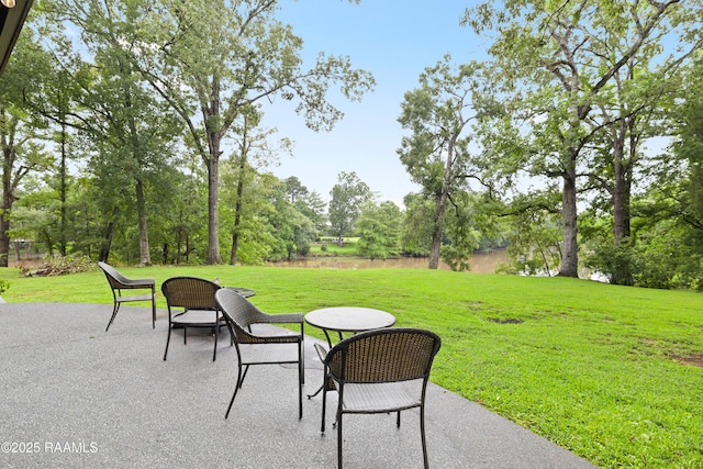 1 Eureka Plantation Rd, Lafayette, LA 70508 - view of patio / terrace with view of scattered trees