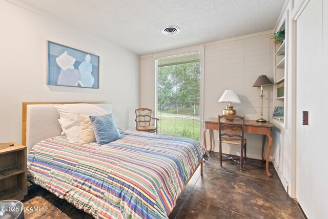 1 Eureka Plantation Rd, Lafayette, LA 70508 - bedroom with finished concrete flooring and a textured ceiling