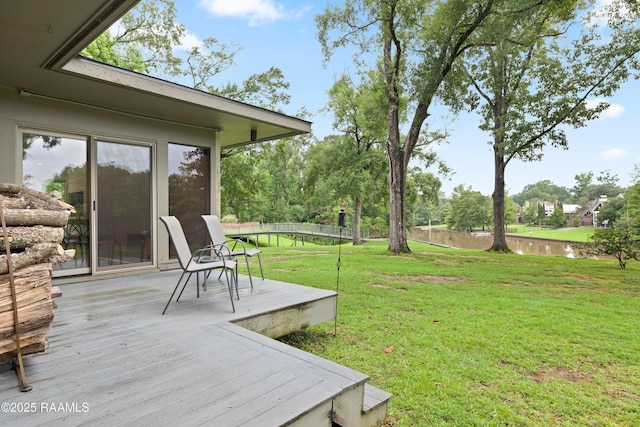 1 Eureka Plantation Rd, Lafayette, LA 70508 - view of green lawn with a wooden deck