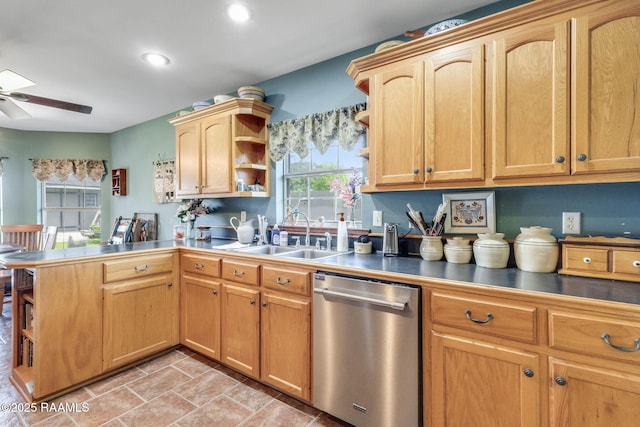 kitchen with open shelves, a sink, ceiling fan, a peninsula, and stainless steel dishwasher