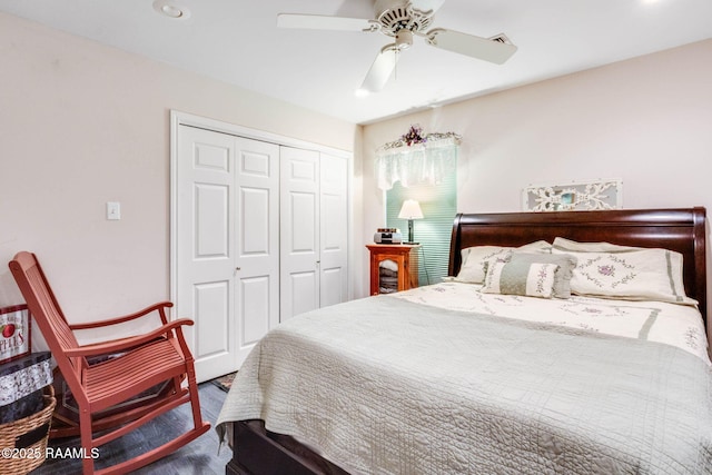 bedroom with a closet, ceiling fan, wood finished floors, and recessed lighting