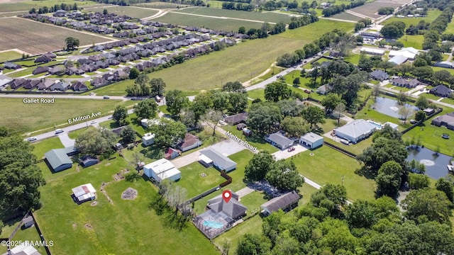 aerial view featuring a residential view and a water view