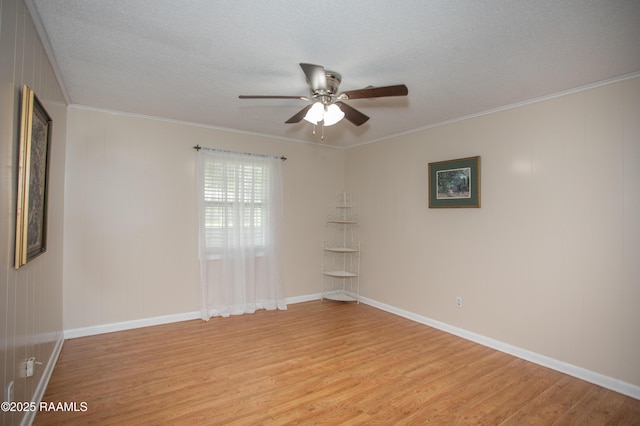 140 Saint Leo St, Opelousas, LA 70570 - spare room with light wood-style flooring, ornamental molding, and a ceiling fan