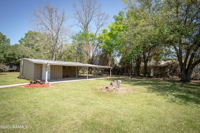 140 Saint Leo St, Opelousas, LA 70570 - view of yard with a carport and an outdoor structure