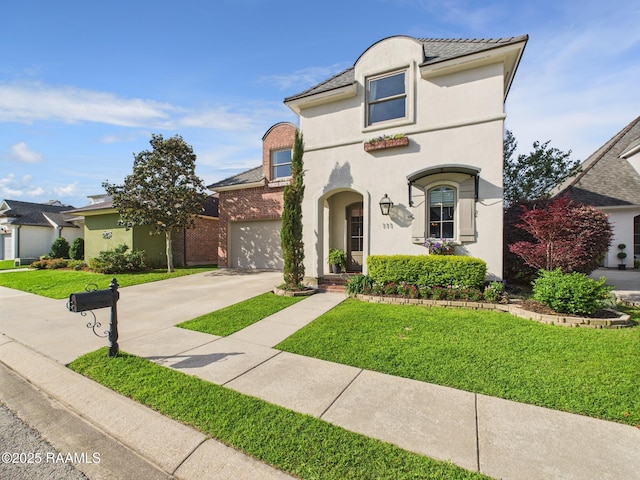 111 Croft Row, Lafayette, LA 70503 - view of front of home featuring a garage, stucco siding, driveway, and a front lawn