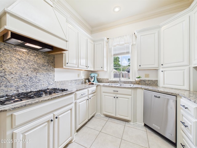 111 Croft Row, Lafayette, LA 70503 - kitchen featuring custom range hood, a sink, white cabinetry, and appliances with stainless steel finishes