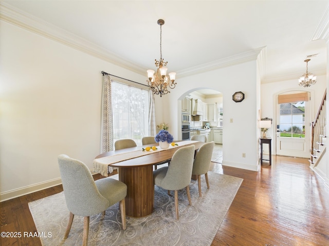 111 Croft Row, Lafayette, LA 70503 - dining room with stairs, arched walkways, an inviting chandelier, and ornamental molding