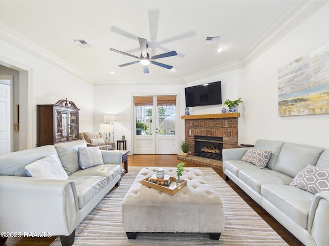 111 Croft Row, Lafayette, LA 70503 - living area featuring visible vents, ornamental molding, ceiling fan, and wood finished floors