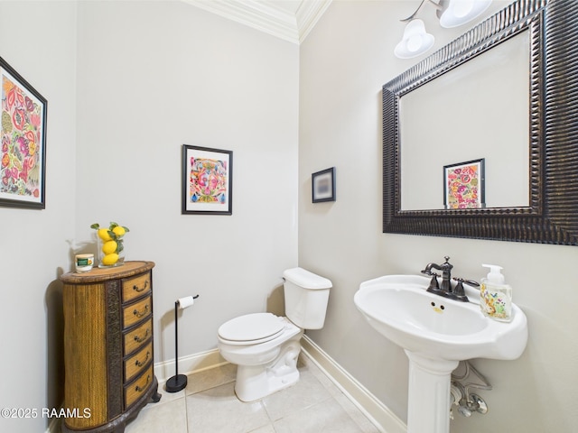 111 Croft Row, Lafayette, LA 70503 - bathroom with baseboards, ornamental molding, tile patterned flooring, and toilet