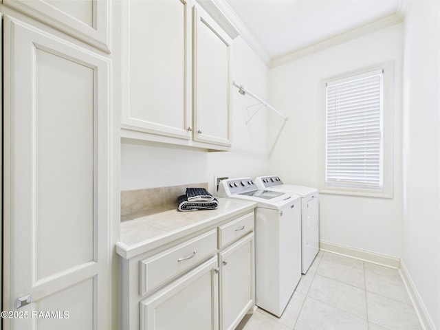 111 Croft Row, Lafayette, LA 70503 - clothes washing area with crown molding, cabinet space, baseboards, light tile patterned floors, and washer and clothes dryer