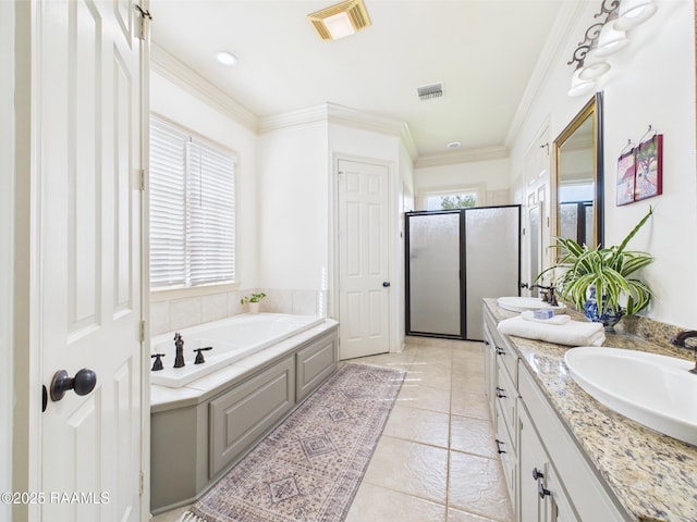 111 Croft Row, Lafayette, LA 70503 - bathroom featuring a sink, double vanity, visible vents, a garden tub, and a stall shower